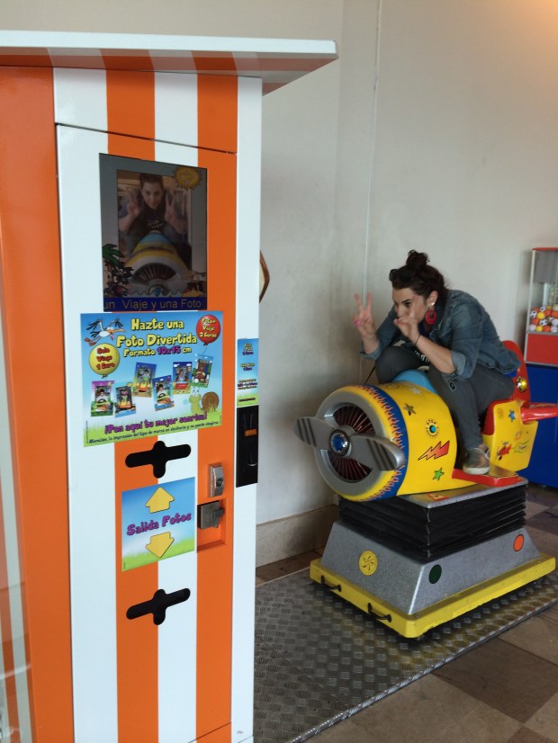 Since I'm not supposed to take photos of my Spanish kids, here's a photo of me trying to squeeze my large ass into a child's photobooth ride.